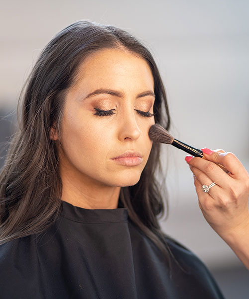 Client receiving makeup services