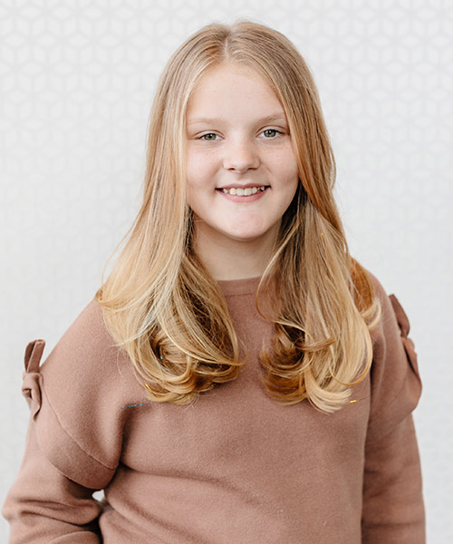 Blonde child with pretty long hair